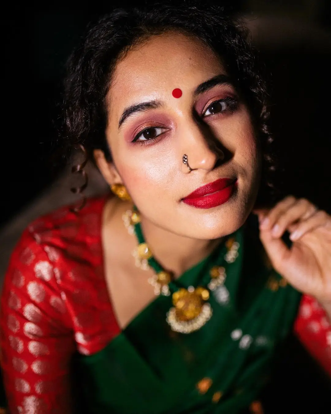 Pooja Ramachandran Stills in Green Saree Red Blouse